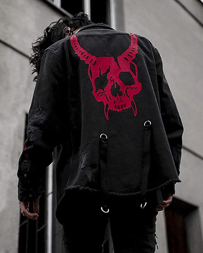 man wearing torn jean jacket red skull on back