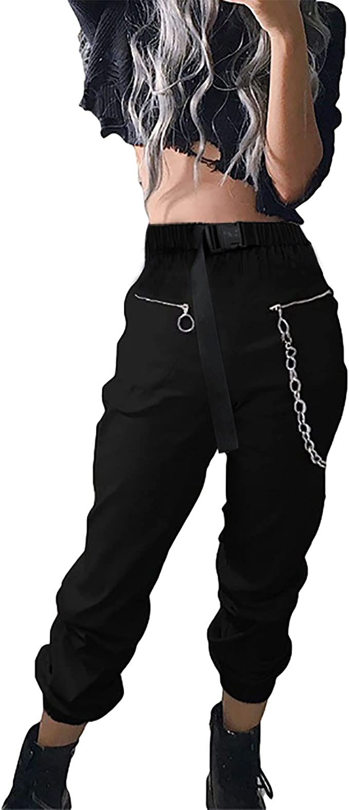 women wearing black pants with chain